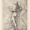 Soldier, Standing, Holding a Long Cane before a Rocky Wall