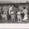 Girls packing fruit in the Fort Pierce packinghouse. Many of the employees are migratory laborers