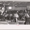 Packing celery at Sanford, Florida. Many of these workers are migrants