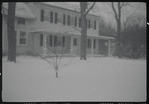 House and trees in snow
