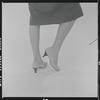 Woman modeling Pappagallo shoes