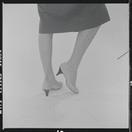 Woman modeling Pappagallo shoes