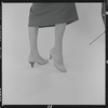 Woman modeling Pappagallo shoes