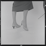 Woman modeling Pappagallo shoes