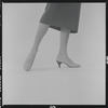 Woman modeling Pappagallo shoes