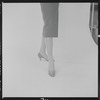 Woman modeling Pappagallo shoes