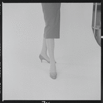 Woman modeling Pappagallo shoes