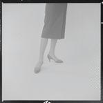 Woman modeling Pappagallo shoes