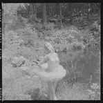 Tanaquil Le Clercq outdoors in costume for "Swan Lake"