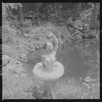 Tanaquil Le Clercq outdoors in costume for "Swan Lake"