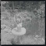 Tanaquil Le Clercq outdoors in costume for "Swan Lake"