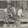 Sharecropper and child on porch of company house. Arkansas. 1935