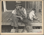 Sharecropper and child on porch of company house. Arkansas. 1935