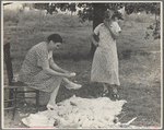 Demonstrating process of canning corn at community canning kitchen near Atkins, Arkansas