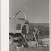 Setting up camp, Quarter Circle U roundup, Montana