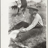 Dude girl "rassling" a calf, Quarter Circle U Ranch roundup, Montana