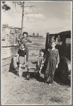 Children of a migrant fruit worker from Tennessee. The family is camped in a field near the packinghouse at Winter Haven, Florida. 1937