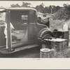 Car used by migrant agricultural workers; the rear has been fixed up as a bed, near Winter Haven, Florida