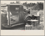 Car used by migrant agricultural workers; the rear has been fixed up as a bed, near Winter Haven, Florida
