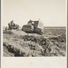 Leveling fields to prevent wind erosion on project near Liberal, Kansas
