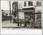 Pawnshop and milk wagon, Québec, Canada