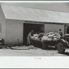 Loading supplies into shed, Wabash Farms, Indiana