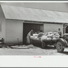 Loading supplies into shed, Wabash Farms, Indiana