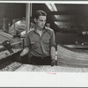 Steelworker at galvanizing machine, Pittsburgh, Pennsylvania