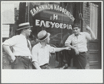 Steelworkers talking to the proprietor of a coffee shop whose name dedicates it to "liberty," Aliquippa, Pennsylvania