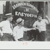 Steelworkers talking to the proprietor of a coffee shop whose name dedicates it to "liberty," Aliquippa, Pennsylvania