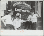 Steelworkers talking to the proprietor of a coffee shop whose name dedicates it to "liberty," Aliquippa, Pennsylvania