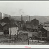 Center of town with steel plant behind business district, Midland, Pennsylvania