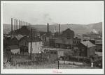 Center of town with steel plant behind business district, Midland, Pennsylvania