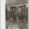 Sharecroppers being moved away from roadside by highway officials to area between levee and Mississippi River, New Madrid County, Missouri