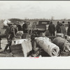 State highway officials moving sharecroppers away from roadside to area between the levee and the Mississippi River, New Madrid County, Missouri