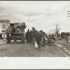 New Madrid County, Missouri. State highway officials moving sharecroppers away from roadside to area between the levee and the Mississippi River