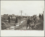 State highway officials moving sharecroppers from roadside to area between levee and Mississippi River, New Madrid County, Missouri