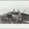 A shanty built of refuse near the Sunnyside slack pile, Herrin, Illinois. Many residences in southern Illinois coal towns were built with money borrowed from building and loan associations