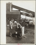 Miners drawing drinking water at Old Ben No. 8 mine, West Frankfort, Illinois
