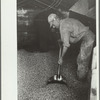 Emptying a truck full of shelled corn at elevator, Grundy Center, Iowa