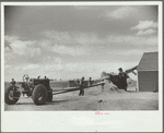 Threshing grain, San Luis Valley Farms, Alamosa, Colorado