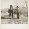 Rehabilitation client and stallion obtained through rehabilitation loan. Dona Ana County, New Mexico