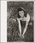 Girl picking cranberries, Burlington County, New Jersey