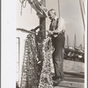 Oysterman with dredge for gathering oysters, Bivalve, New Jersey