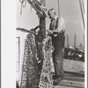 Oysterman with dredge for gathering oysters, Bivalve, New Jersey