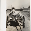Resident of "Eighty Acres" with load of firewood, Glassboro, New Jersey