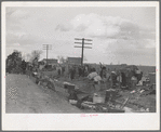 State highway officials moving sharecroppers away from roadside to area between the levee and Mississippi River, New Madrid County, Missouri