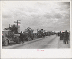 State highway officials moving sharecroppers away from roadside to area between levee and Mississippi River, New Madrid County, Missouri