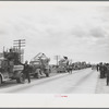 State highway officials moving sharecroppers away from roadside to area between levee and Mississippi River, New Madrid County, Missouri