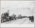 State highway officials moving sharecroppers away from roadside to area between levee and Mississippi River, New Madrid County, Missouri